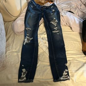 Blue distressed jeans